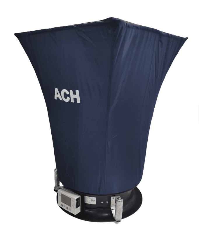 ACH-1 Accubalance air flow capture hood being used to measure air volume from a ceiling diffuser for HVAC balancing.