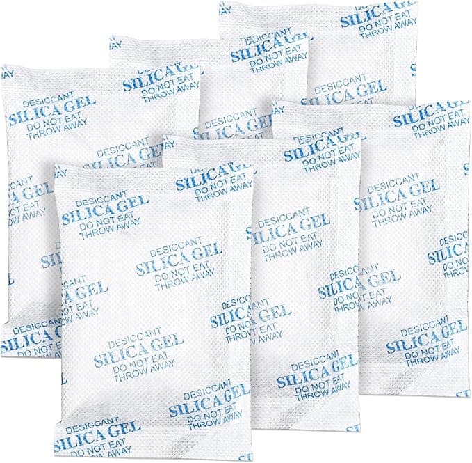 A 50 gram silica gel packet moisture absorber featuring top-grade white beads for safe storage.